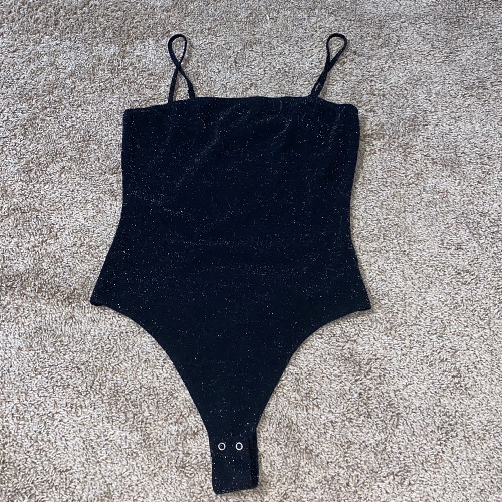 Black glittery body suit